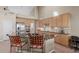 Eat-in kitchen offers a dining area, granite counters, stainless steel appliances, and an open floorplan at 6216 W Morrow Dr, Glendale, AZ 85308