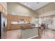 Spacious kitchen features a large island, granite countertops, stainless steel appliances, and bright breakfast nook at 6216 W Morrow Dr, Glendale, AZ 85308