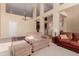 Spacious living room with high ceilings and comfortable seating at 6216 W Morrow Dr, Glendale, AZ 85308