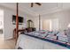Main bedroom with king-size bed, TV and plenty of space at 6216 W Morrow Dr, Glendale, AZ 85308