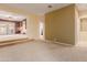Spacious office area with wood cabinets and carpet at 6216 W Morrow Dr, Glendale, AZ 85308
