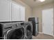 Functional laundry room with LG washer and dryer at 6664 S Jacqueline Way, Gilbert, AZ 85298