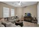 Relaxing living room with sectional sofa and wood floors at 6664 S Jacqueline Way, Gilbert, AZ 85298