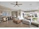 Open concept living room and kitchen with wood flooring at 6664 S Jacqueline Way, Gilbert, AZ 85298