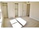 Well-lit bedroom with ample closet space and carpet at 8144 E Kilarea Ave, Mesa, AZ 85209