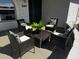 Inviting front porch with seating area, perfect for enjoying outdoor relaxation at 8144 E Kilarea Ave, Mesa, AZ 85209