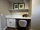 Functional built-in home office with a stylish white quartz countertop and bright white cabinetry at 8144 E Kilarea Ave, Mesa, AZ 85209