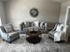 Beautifully decorated living room with modern furniture and stylish accents at 8144 E Kilarea Ave, Mesa, AZ 85209