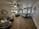 Open-concept living space with sleek flooring, and plenty of room for entertaining at 8144 E Kilarea Ave, Mesa, AZ 85209