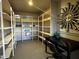 Spacious room with ample shelving and stylish decor; ideal for organized storage or flexible use at 8144 E Kilarea Ave, Mesa, AZ 85209