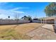 Spacious backyard features block fence, mature trees and covered patio at 914 N Cameron Ave, Casa Grande, AZ 85122