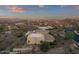 Aerial view of a luxury home with desert landscape and mountain views at 10031 N Palisades Blvd, Fountain Hills, AZ 85268