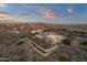 Aerial view of home showcasing backyard and mountain views at sunset at 10031 N Palisades Blvd, Fountain Hills, AZ 85268