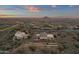 Aerial view of home showcasing backyard patio and mountain views at 10031 N Palisades Blvd, Fountain Hills, AZ 85268