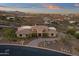 Aerial view of a luxury home with mountain views and desert landscape at 10031 N Palisades Blvd, Fountain Hills, AZ 85268