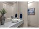 Elegant bathroom with quartz countertop, vessel sink, and modern fixtures at 10031 N Palisades Blvd, Fountain Hills, AZ 85268