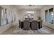 Elegant dining room with a large chandelier and plenty of natural light at 10031 N Palisades Blvd, Fountain Hills, AZ 85268