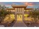 Modern two-story home with a paver walkway leading to the front entrance at 10031 N Palisades Blvd, Fountain Hills, AZ 85268