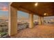 Large covered patio with pavers, city views, and built-in grill at 10031 N Palisades Blvd, Fountain Hills, AZ 85268