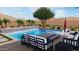 Modern pool and patio area with fire pit at 10031 N Palisades Blvd, Fountain Hills, AZ 85268