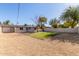 Landscaped backyard featuring artificial turf and gravel at 1018 S Butte Ave, Tempe, AZ 85281