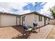 Cozy backyard patio with brick pavers and comfortable seating under a sunny sky at 1018 S Butte Ave, Tempe, AZ 85281