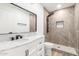 Updated bathroom with walk-in shower, marble vanity, and modern fixtures at 1018 S Butte Ave, Tempe, AZ 85281