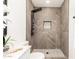 Elegant bathroom features a tiled shower with rainfall head and mosaic details at 1018 S Butte Ave, Tempe, AZ 85281