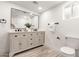 Bathroom features dual sink vanity and a large mirror at 1018 S Butte Ave, Tempe, AZ 85281