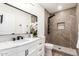 Stylish bathroom featuring marble countertop, modern fixtures, and tiled shower with rainfall head at 1018 S Butte Ave, Tempe, AZ 85281