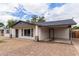 Side view of charming single-story home with covered carport at 1018 S Butte Ave, Tempe, AZ 85281