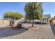 Spacious backyard with gravel and desert plants at 10356 W Ross Ave, Peoria, AZ 85382