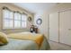 Bedroom with window shutters and decorative wall art at 10356 W Ross Ave, Peoria, AZ 85382