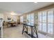 Casual dining area with wood table and chairs, adjacent to kitchen at 10356 W Ross Ave, Peoria, AZ 85382