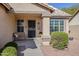 Covered entryway with security door and a small bench at 10356 W Ross Ave, Peoria, AZ 85382