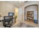 Home office with a built-in bookcase and plenty of natural light at 10356 W Ross Ave, Peoria, AZ 85382