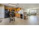 Modern kitchen with black appliances and wood cabinets at 10356 W Ross Ave, Peoria, AZ 85382