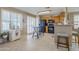 Kitchen boasts wood cabinets, black appliances, and tile floors at 10356 W Ross Ave, Peoria, AZ 85382