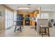 Modern kitchen with black appliances and wood cabinets at 10356 W Ross Ave, Peoria, AZ 85382