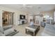 Bright and airy living room featuring a fireplace and comfy furniture at 10356 W Ross Ave, Peoria, AZ 85382