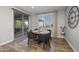 Small dining area with sliding door to backyard at 10556 E Relativity Ave, Mesa, AZ 85212