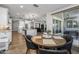 Kitchen dining area with round table and access to patio at 10556 E Relativity Ave, Mesa, AZ 85212