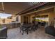 Outdoor kitchen and dining area at 10556 E Relativity Ave, Mesa, AZ 85212