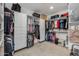 Spacious walk-in closet with custom shelving and drawers at 10556 E Relativity Ave, Mesa, AZ 85212