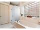 Relaxing bathroom featuring a soaking tub and a walk-in shower at 11060 E Mark Ln, Scottsdale, AZ 85262