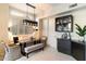 Charming kitchen nook with built-in bench seating and wood table at 11060 E Mark Ln, Scottsdale, AZ 85262