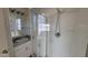 Bathroom with shower stall, granite countertop, and single sink at 11215 W Heatherbrae Dr, Phoenix, AZ 85037