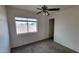 Bedroom with carpet and ceiling fan at 11215 W Heatherbrae Dr, Phoenix, AZ 85037