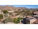 Stunning aerial view showcasing backyard oasis, pool, and mountain backdrop at 12824 E Jenan Dr, Scottsdale, AZ 85259