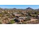 Aerial view showcasing house, pool, and mountain views at 12824 E Jenan Dr, Scottsdale, AZ 85259